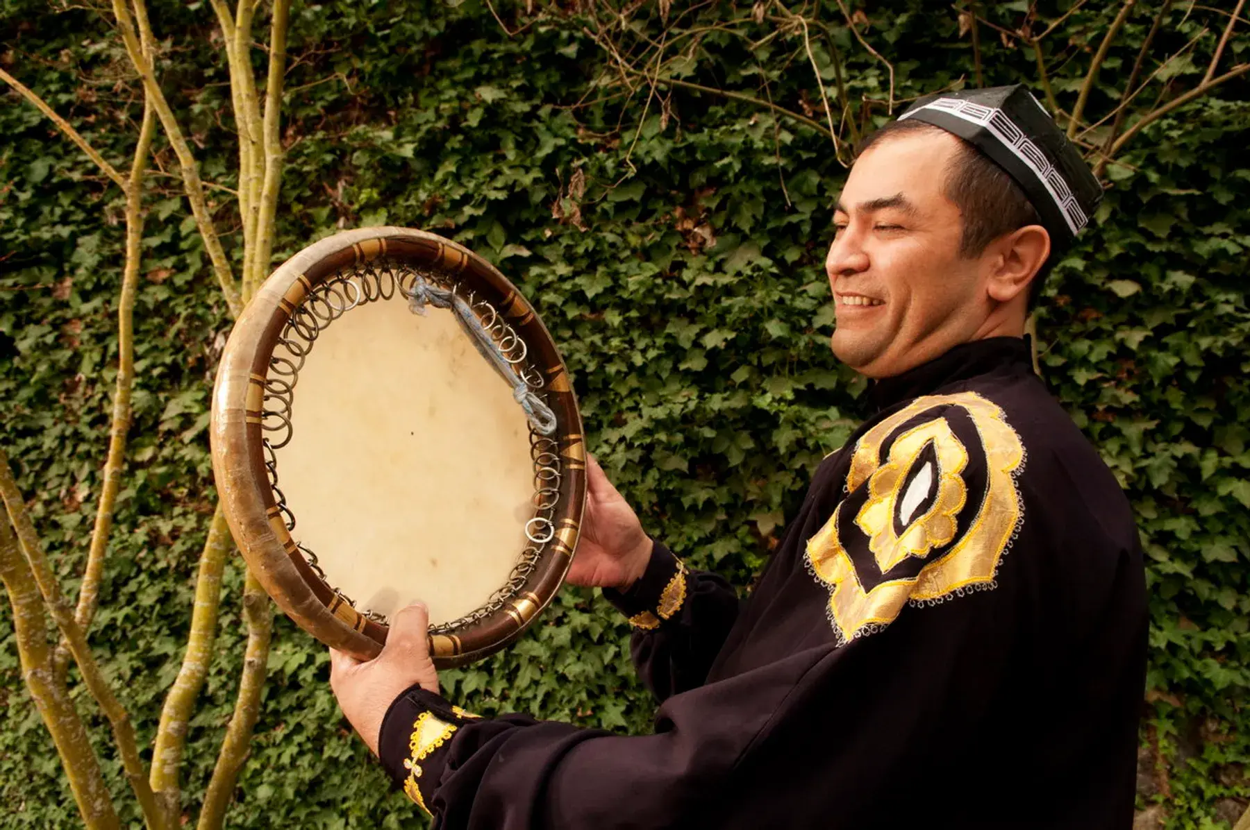 Abbos Kosimov with the doira frame drum
